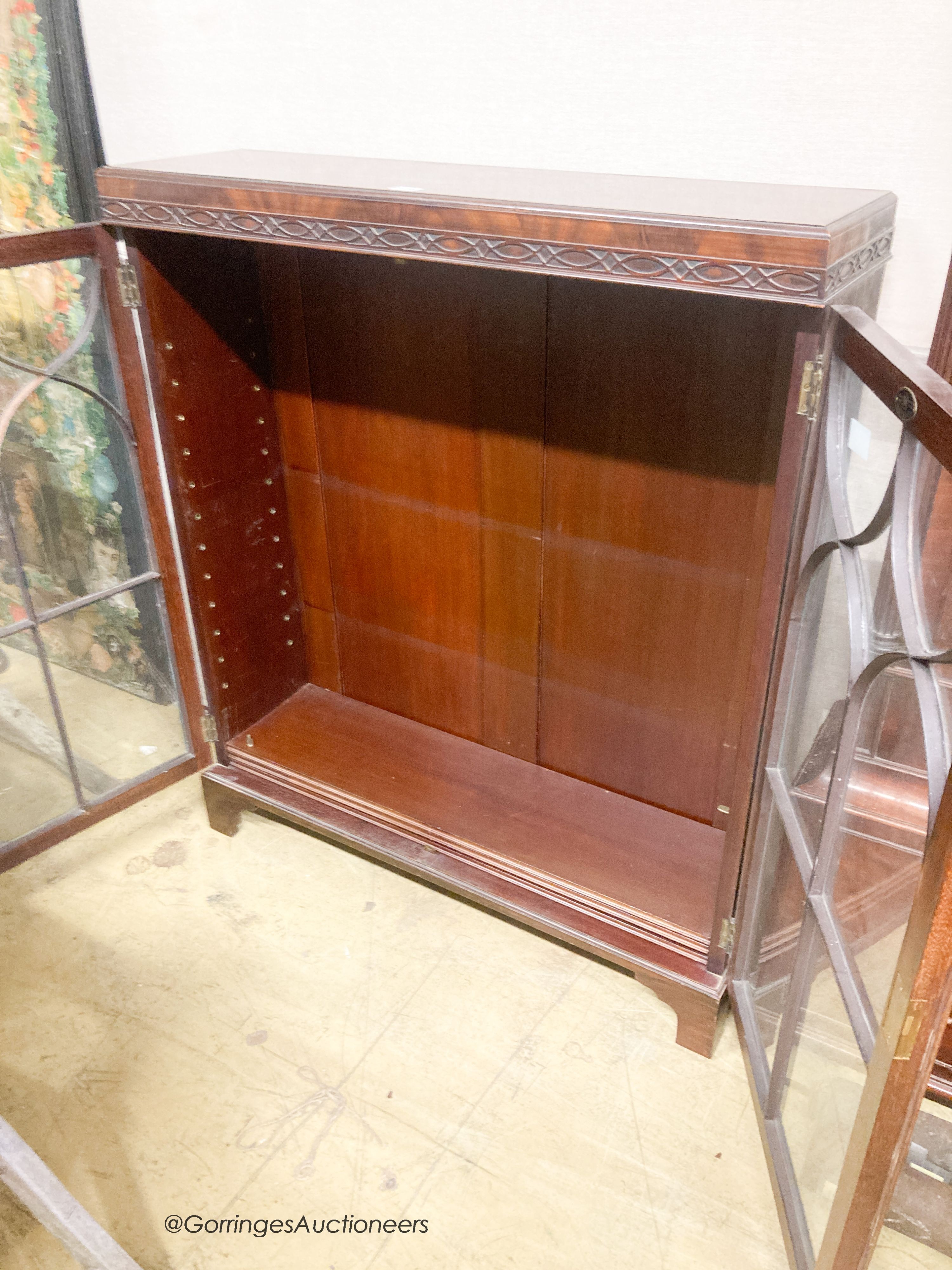 A 1920's Georgian style mahogany bookcase, width 91cm, depth 26cm, height 108cm